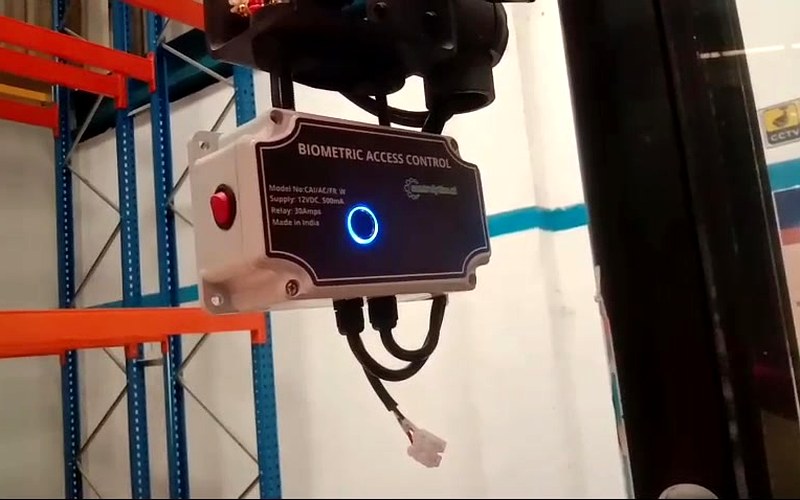 Biometric access control mounted on forklift in warehouse